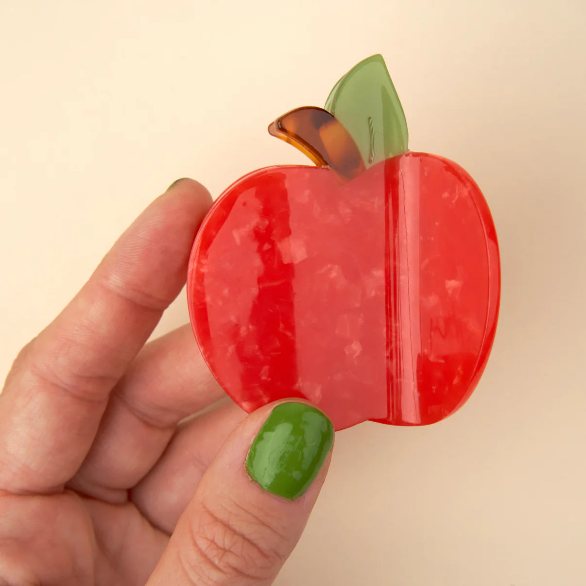 PINZA DE PELO MANZANA 