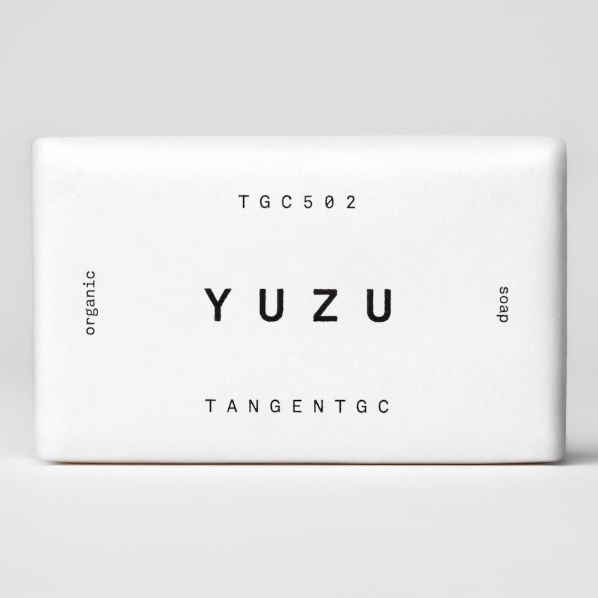 TGC502 YUZU SOAP BAR TGC502 Yuzu soap bar by Tangent GC, TGC502 is an organic soap bar – with fruity, acid and citric yuzu perfume. The soap is made of pure natural fats and vegetable glycerine that will keep your hands soft. This is green. Ever since Tangent GC set out in 2012 sustainability has been central to them. Tangent GC products are natural and organic, and they have been from the outset. The natural aspect was important, not only in order to avoid harmful chemicals, but as a mean to raise the over